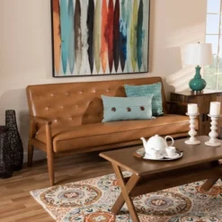 Sorrento Mid-Century Faux Leather Upholstered Wood Sofa Walnut/Brown - Baxton Studio -Lush Living Store GUEST 648b45d3 f98c 4ef5 833e ba2e9d1477c5