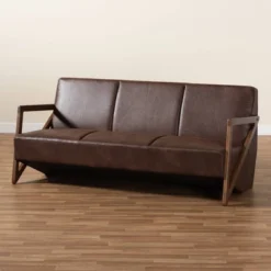 Christa Faux Leather Effect Fabric Upholstered Wood Sofa Dark Brown/Walnut Brown - Baxton Studio -Lush Living Store GUEST 742c2af8 1e2f 45c1 81c5 9803660511c3