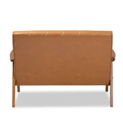 Nikko Mid-Century Faux Leather Upholstered Wood Loveseat Walnut/Brown - Baxton Studio 11 Nikko Mid-Century Faux Leather Upholstered Wood Loveseat Walnut/Brown - Baxton Studio -Lush Living Store GUEST ef7ccb96 7422 4862 aa6f a4fdd26f416f